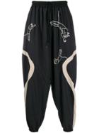 Bernhard Willhelm Tiger Print Loose-fit Trousers - Black