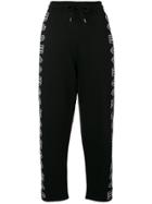 Mcq Alexander Mcqueen Cropped Repeat Logo Track Pants - Black