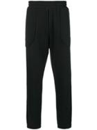Mcq Alexander Mcqueen Glyph Icon Tracksuit Trousers - Black
