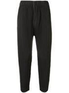 Homme Plissé Issey Miyake Tapered Plisse Trousers - Grey