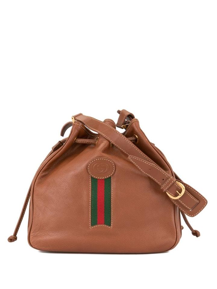 Gucci Pre-owned Gg Embossed Drawstring Shoulder Bag - Brown