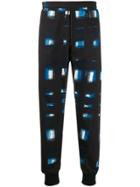 Alexander Mcqueen Printed Tapered Track Trousers - Blue