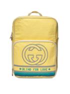 Gucci Medium Backpack With Interlocking G Print - Yellow