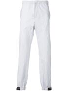 Prada Striped Logo Patch Trousers - Blue