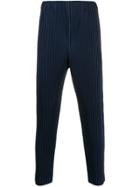 Homme Plissé Issey Miyake Ribbed Tapered Trousers - Blue
