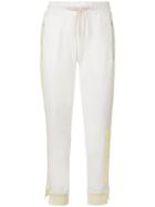 Walk Of Shame Cropped Logoed Track Pants - White