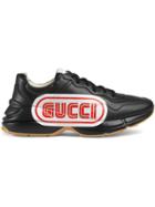 Gucci Rhyton Gucci Print Leather Sneaker - Black