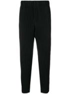 Homme Plissé Issey Miyake Pleated Tapered Trousers - Black