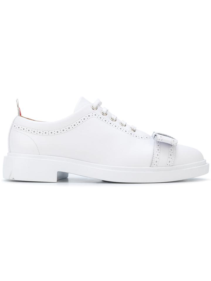 Thom Browne Brogued Trainer With Bow & Lightweight Rubber Sole In Calf