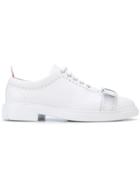 Thom Browne Brogued Trainer With Bow & Lightweight Rubber Sole In Calf