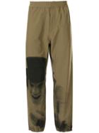 Undercover A Clockwork Orange Print Track Pants - Green