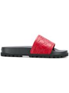 Gucci Supreme Embossed Slides - Red