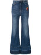 Dolce & Gabbana Flared Jeans With Sacred Heart Appliqué - Blue