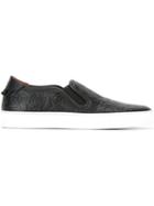 Givenchy Logo Embossed Low Skate Sneakers