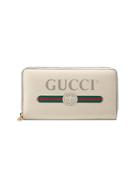 Gucci Gucci Print Leather Zip Around Wallet - Nude & Neutrals