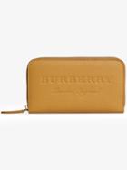 Burberry Embossed Leather Ziparound Wallet - Nude & Neutrals