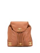 Chanel Pre-owned Triple Cc Drawstring Backpack - Brown