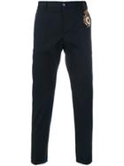 Dolce & Gabbana Medal Appliqué Skinny Trousers - Blue