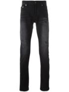 Saint Laurent Distressed Skinny Jeans - Black
