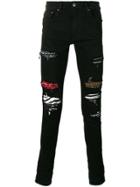 Amiri Patched And Ripped Skinny Jeans - Black
