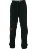 Mcq Alexander Mcqueen Embroidered Slogan Track Pants - Black
