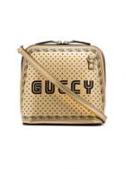 Gucci Metallic Gold And Black Gucci Star Print Leather Bag -