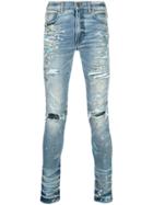 Amiri Paint Splatter Skinny Jeans - Blue