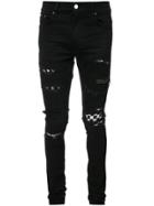 Amiri Ripped Checker Patch Skinny Jeans - Black