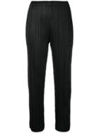 Pleats Please By Issey Miyake Cropped Tapered Trousers - Black