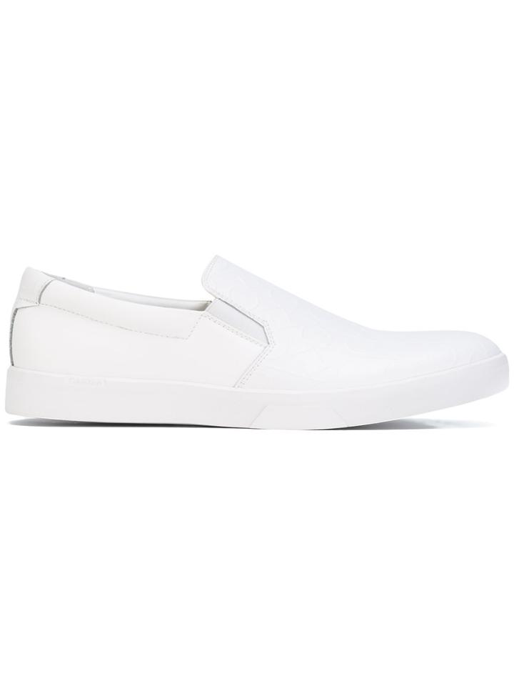 Calvin Klein Logo Embossed Slip-on Sneakers - White