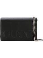 Gucci Embossed Logo Shoulder Bag