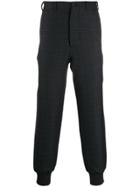Alexander Mcqueen Check Print Tapered Trousers - Black