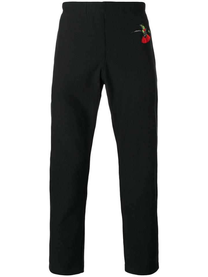 Alexander Mcqueen Swallow Print Tapered Trousers - Black