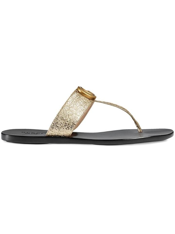 Gucci Gold Double G Leather Thong Sandal. - Metallic