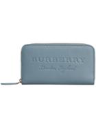 Burberry Embossed Leather Ziparound Wallet - Blue