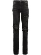 Amiri Slim-fit Distressed Cotton And Leather Jeans - Black