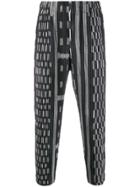Homme Plissé Issey Miyake Abstract Pattern Tapered Trousers - Grey