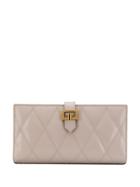 Givenchy Gv3 Long Wallet In Diamond Quilted Leather - Neutrals
