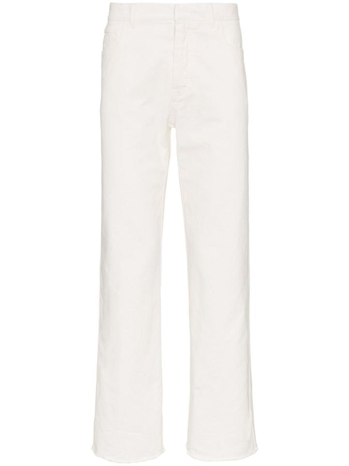Haider Ackermann Raw Hem Tapered Cotton Denim Jeans - White