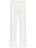 Haider Ackermann Raw Hem Tapered Cotton Denim Jeans - White
