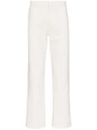Haider Ackermann Raw Hem Tapered Cotton Denim Jeans - White