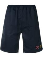 Alexander Mcqueen Embroidered Badge Shorts - Blue