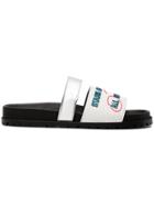 Sacai Flat Slogan Embossed Slides - Black