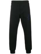 Alexander Mcqueen Embroidered Crest Track Trousers - Black