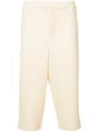 Homme Plissé Issey Miyake Cropped Ribbed Trousers - Yellow & Orange