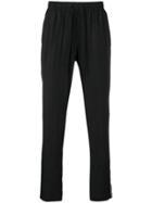 Dolce & Gabbana All Over Logo Trousers - Black