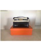 Hermès Vintage Kelly Mini Pochette Black Shiny Alligator With Gold -