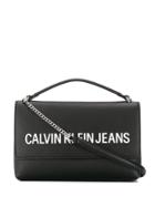 Calvin Klein Embossed Logo Satchel - Black