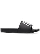 Prada Logo Embossed Flat Slides - Black