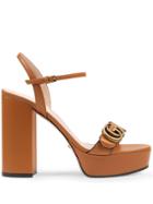 Gucci Gg Plaque Platform Sandals - Brown